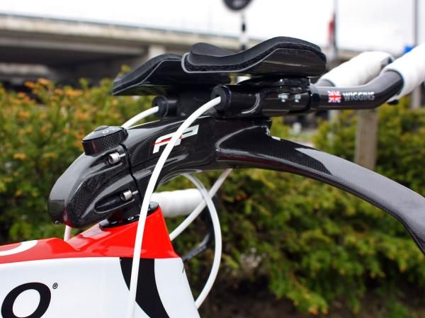 The extended clamp is apparently intended to help smooth airflow coming off the rear of the stem.