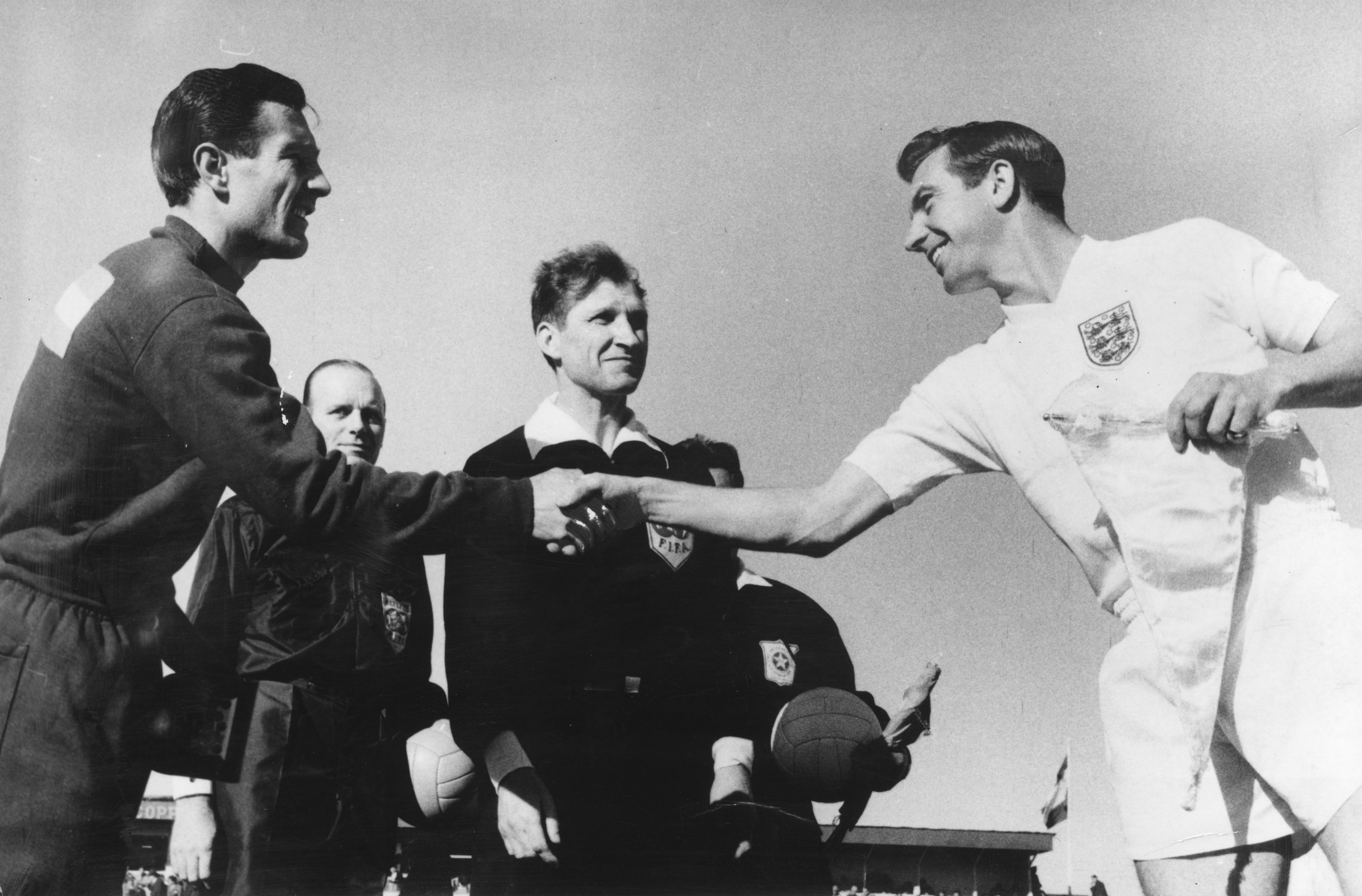 Argentina and England captains shake hands ahead of a match at the 1962 World Cup.