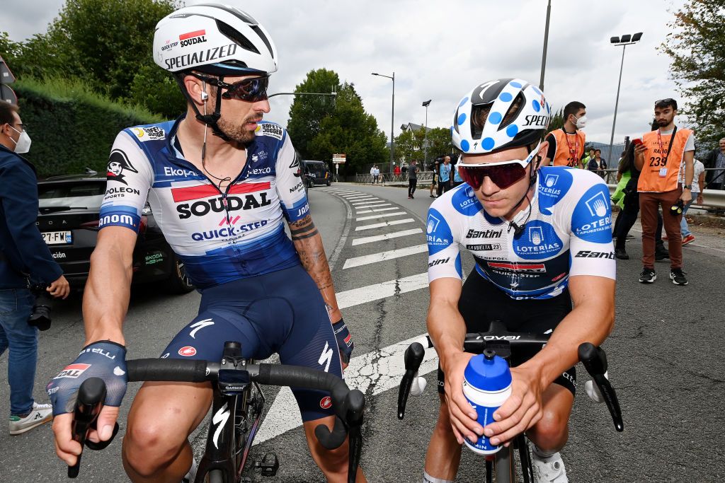 GUADARRAMA SPAIN SEPTEMBER 16 LR Mattia Cattaneo of Italy and second place winner Remco Evenepoel of Belgium and Team Soudal Quick Step Polka dot Mountain Jersey reacts after the 78th Tour of Spain 2023 Stage 20 a 2078km stage from Manzanares El Real to Guadarrama UCIWT on September 16 2023 in Guadarrama Spain Photo by Tim de WaeleGetty Images