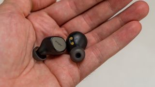 Jabra Elite 7 Pro earbuds held in hand