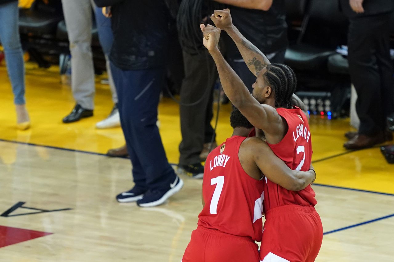 Kyle Lowry #7 and Kawhi Leonard #2 of the Toronto Raptors.