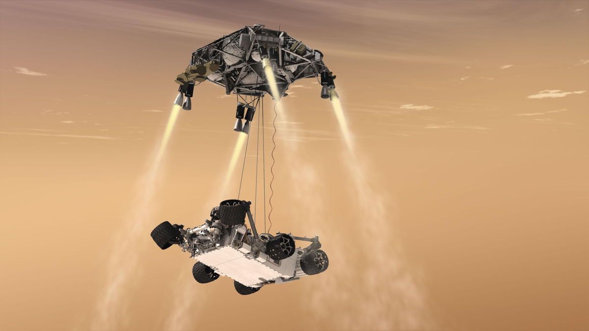 Artist&#039;s illustration of NASA&#039;s Mars rover Curiosity landing via sky crane in August 2012. NASA&#039;s Mars 2020 rover Perseverance will land in the same fashion on Feb. 18, 2021. 