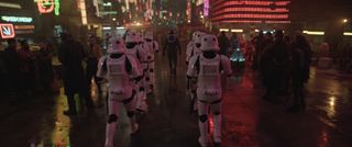 Stormtroopers march in the neon-soaked city planet of Daiyu in Obi-Wan Kenobi