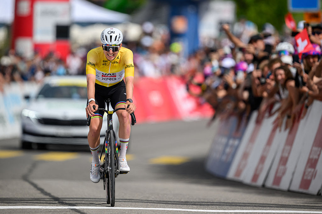 UAE Team Emirates-XRG's Slovenian rider Tadej Pogacar reacts as he crosses the finish line wining the fourth stage of the Tour of Romandie UCI cycling World tour, 149.6 km from Broc and to Charmey, in Charmey, Switzerland, on May, 2, 2026. (Photo by Fabrice COFFRINI / AFP)
