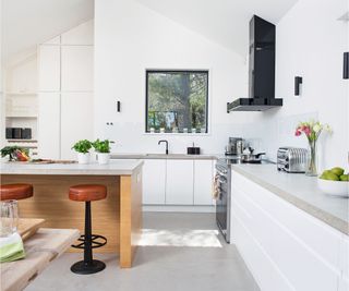 Wooden kitchen island, white cabinets
