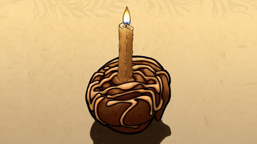 Image of a sweetroll with a candle in it