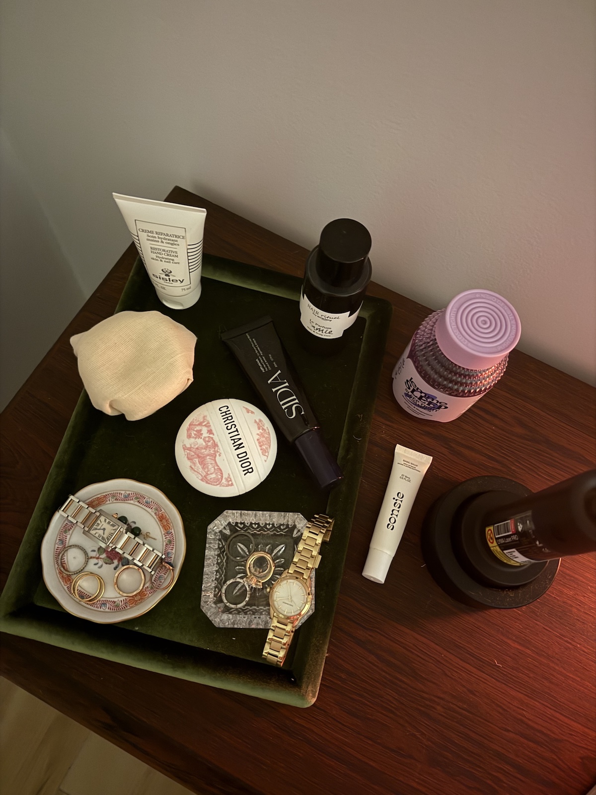 Senior Beauty Editor Jamie Schneider's bedside table