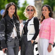 Three women photographed on the street during fashion week