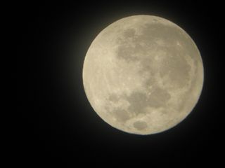 The supermoon of 2012, May's full moon, as seen through a telescope by skywatcher Lisa Delapo from the San Francisco Bay Area in California on May 5, 2012.