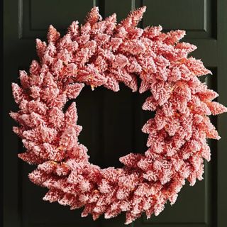 Best Christmas wreath pink hung on door 