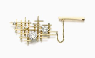 Finest brooch with gold lattice pin, set with four circular-cut diamonds