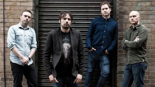 The Pineapple Thief against a wall in 2014