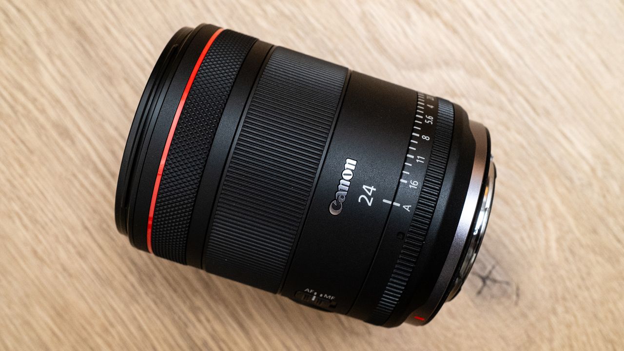 Canon RF 24mm f/1.4L VCM lens on a wooden floor