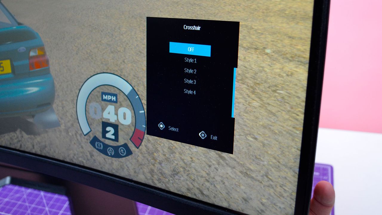 A Gigabyte GS34WQC gaming monitor on a desk