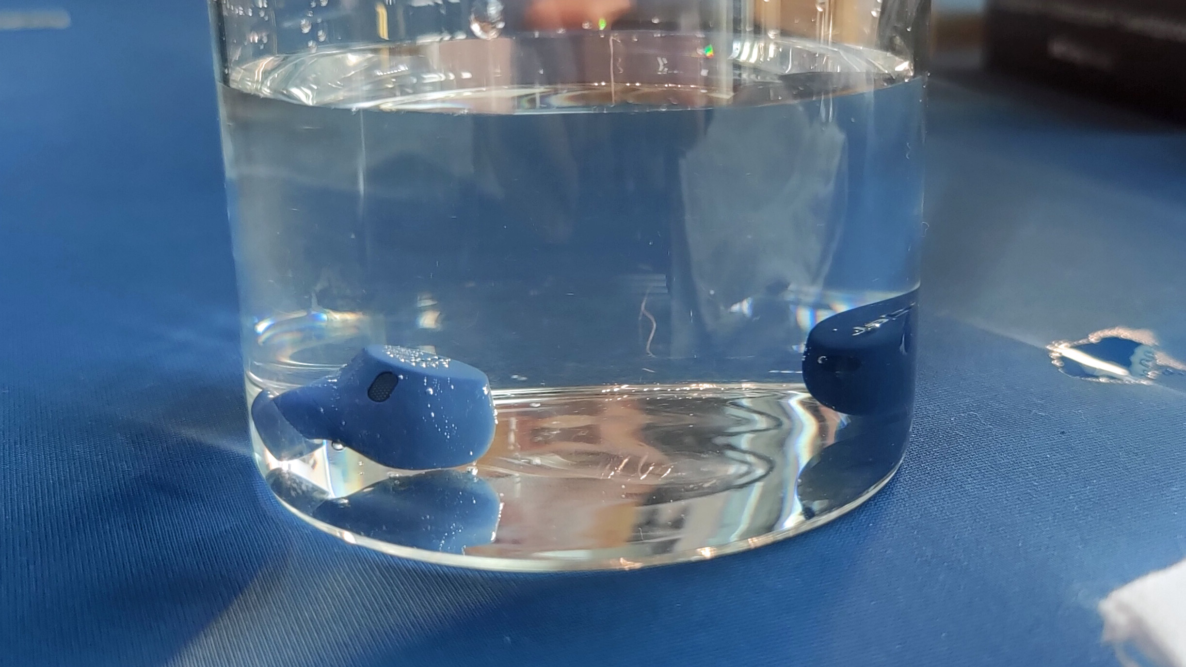I Tested The world s Toughest Earbuds By Dropping Them Into A Glass 
