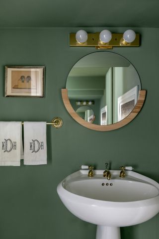 A green-painted bathroom