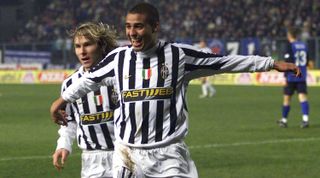 EMPOLI, ITALY - JANUARY 25: Pavel Nedved and David Trezeguet of Juventus celebrate a goal during the Serie A match between Empoli and Juventus played at the Carlo Castellani Stadium on January 25, 2004 in Empoli, Italy. (Photo by Newpress/Getty Images)