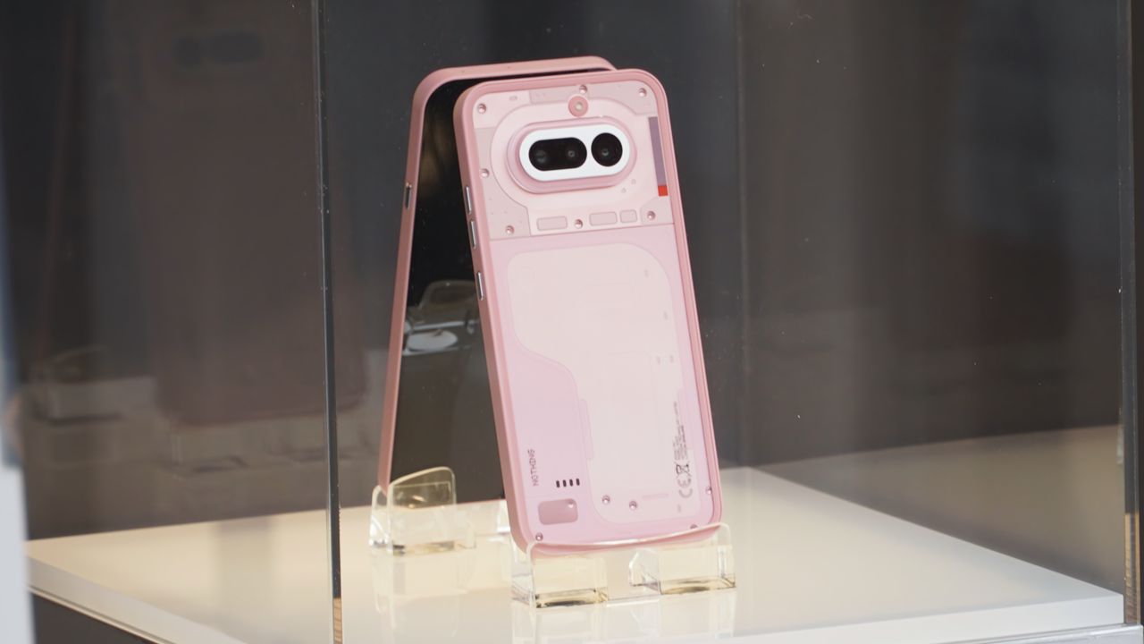 The Nothing Phone 4a on display at MWC 2026 in Black, White, Blue, and Pink colorways.