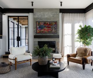 A modern organic living room with an exposed brick fireplace