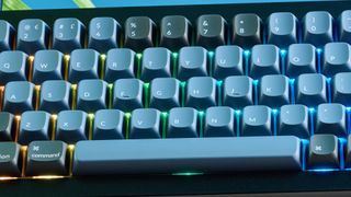 A black and blue Keychron Q7 wired mechanical keyboard that's made of metal