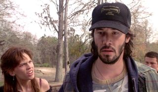 The Gift Hilary Swank mullet Keanu Reeves in trucker's hat