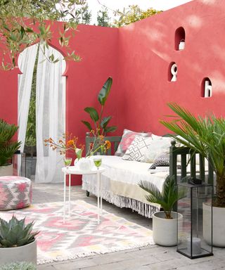 Moroccan styling in pink and grey looks super-stylish. Wall in Hot Brick masonry paint,  27 for 5ltr, Sandtex. Seat in Sargasso Sea woodshield,  9.99 for 2.5ltr, Sadolin