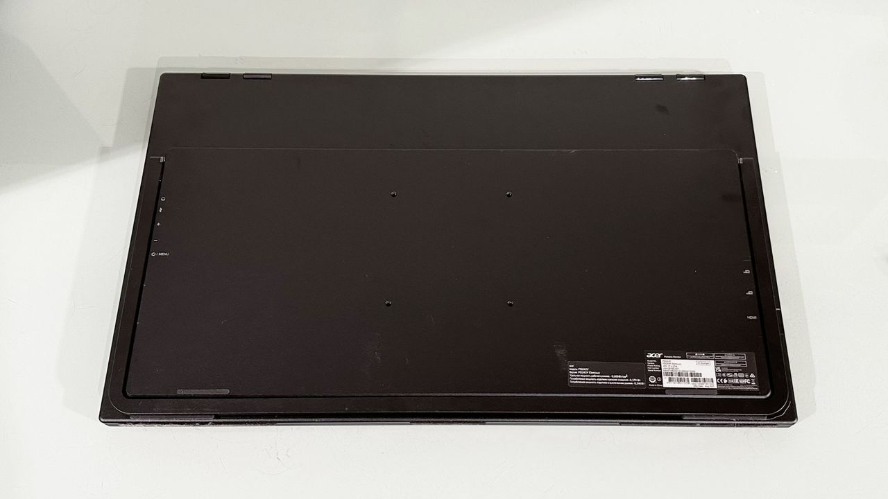 The Acer PD243Y E portable monitor in a home office during our testing