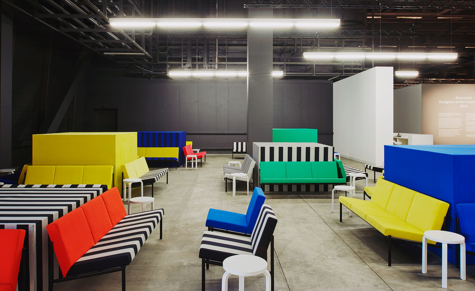 The fair's lounge, designed by Berlin-based architecture studio Kuehn Malvezzi, featured the 1960s Ilmari Tapiovaara collection, reissued by Artek in collaboration with Kvadrat