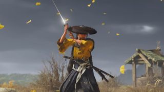 Ghost of Yotei screenshot of Atsu with her arms raised as she wields a katana