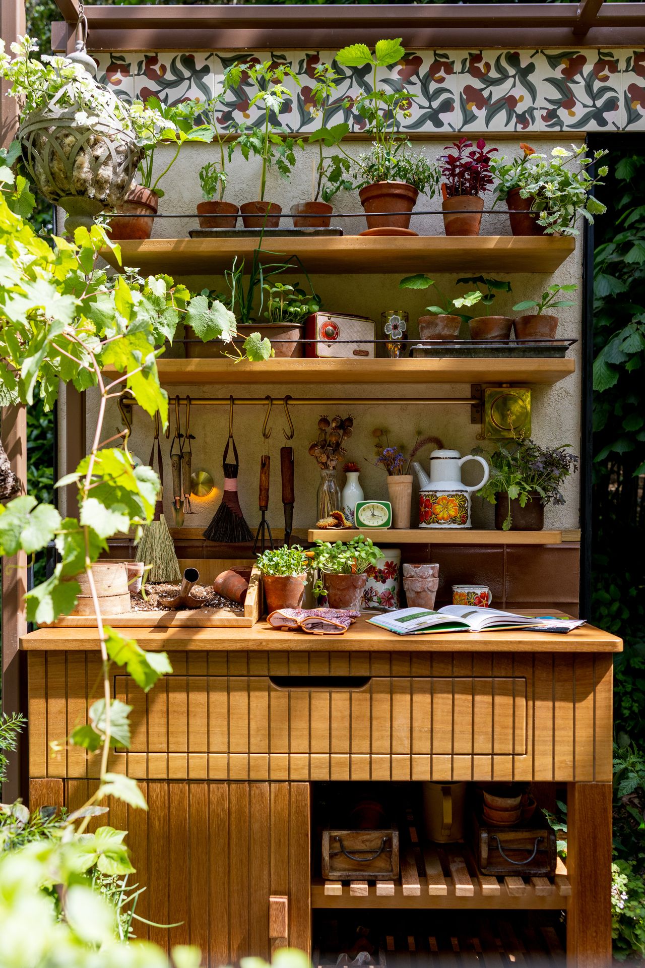 Images and close ups of the balcony garden by Viking, titled A Little Garden of Shared Knowledge.
