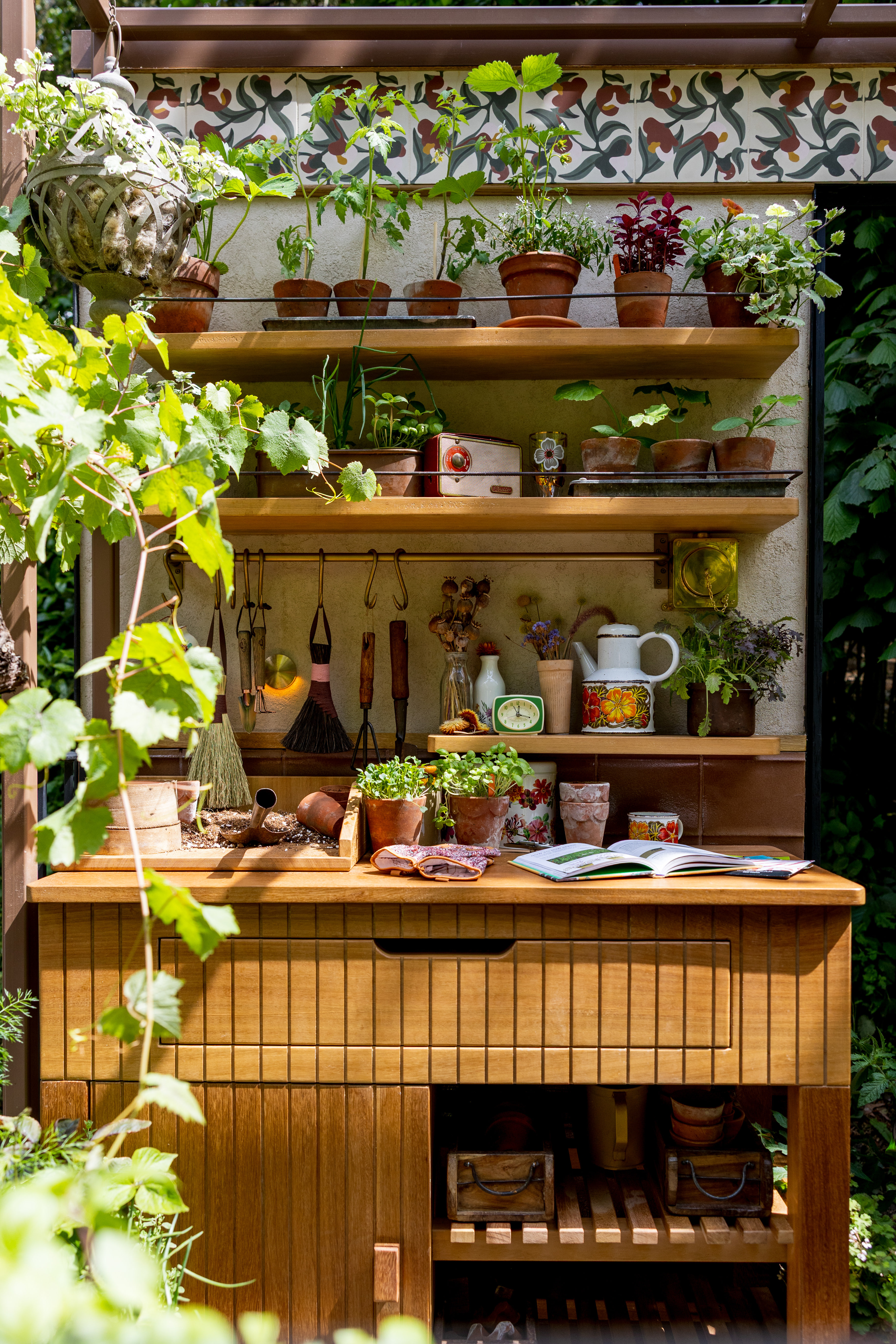 Images and close ups of the balcony garden by Viking, titled A Little Garden of Shared Knowledge.