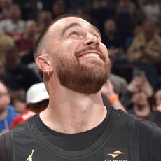Travis Kelce smiles during the game between the Boston Celtics and the Cleveland Cavaliers on March 5, 2024.