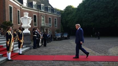 President Donald Trump arrives at Dutch royal palace during NATO summit
