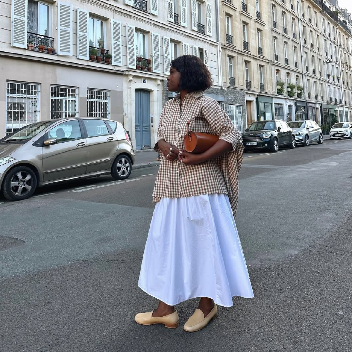 @frannfyne wears white skirt and gingham shirt