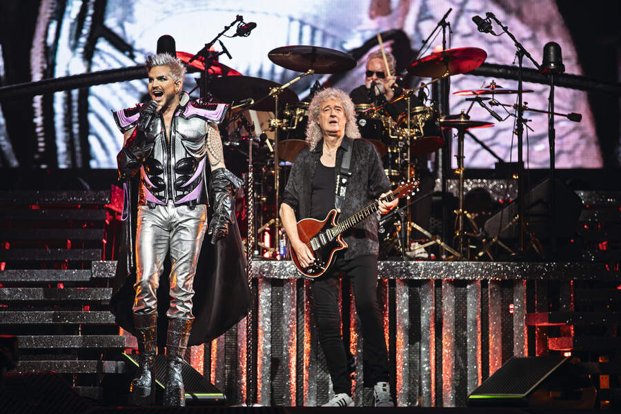 Adam Lambert performs with Brian May and Roger Taylor of Queen at Chase Center on November 08, 2023 in San Francisco, California