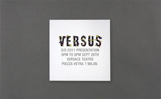 Back view of Versus’ invitation pictured against a grey background