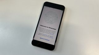 An iPhone SE 2022, in the process of registering WhatsApp