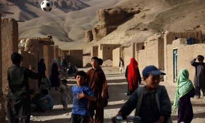 Children play outside their homes in central Afghanistan: In February 2010, the U.S. military accidentally killed more than a dozen civilians, including two children.