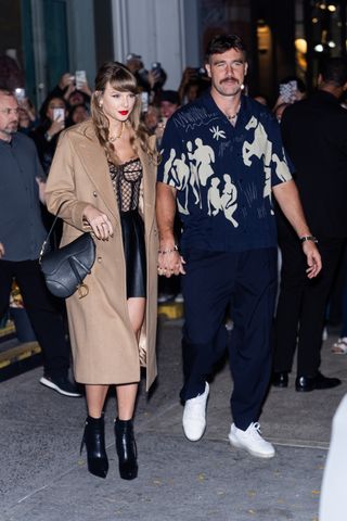 Taylor Swift and Travis Kelce on a date in New York City where taylor wears a camel coat and a gucci corset