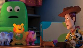 Toy Story 4 Chairol Burnett, Melephant Brooks, Bitey White, and Carl Reineroceros looking at Woody w