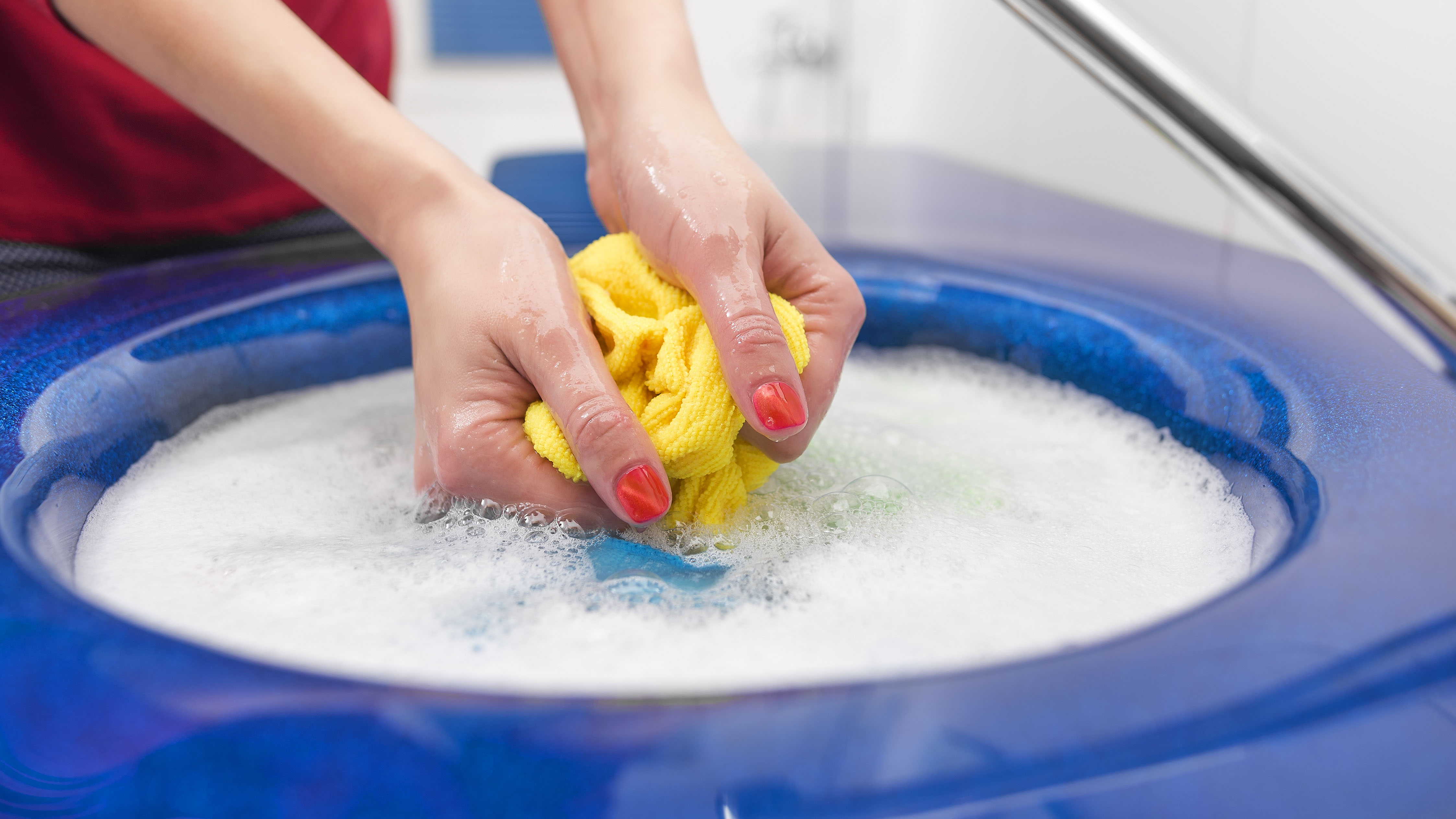 Items being hand washed in soapy water