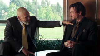 Obadiah Stane (Jeff Bridges) and Tony Stark (Robert Downey Jr.) talk in Iron Man