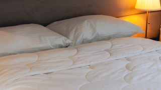 Larke Nature's Blend duvet draped on the bed 