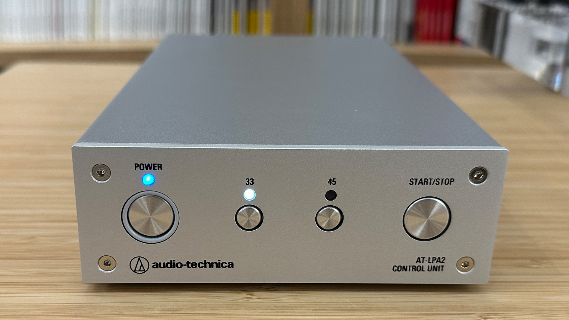 Audio-Technica AT-LPA2 turntable external control on wooden surface