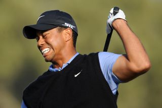 Tiger Woods in pain following golf shot