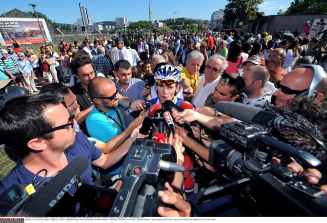 Alexander Kristoff (Katusha) surrounded by the press pack