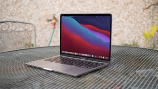 Apple M1 MacBook Pro 13in open, side angle