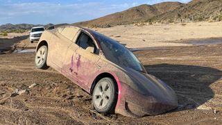 Tesla car stuck in mud in Mojave desert