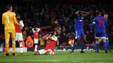 Arsenal captain Pierre-Emerick Aubameyang reacts after his late miss against Olympiacos 