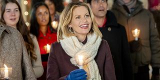 Candace Cameron Bure singing carols in Christmas Town